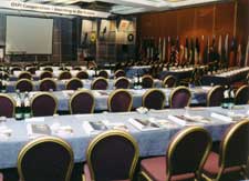 conference room configured for simultaneous interpretation